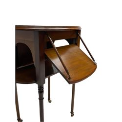 An unusual Edwardian mahogany drop leaf centre table, oval form with two drop leaves on sliding mechanism with turned stays, the leaves fold upwards to conceal the sides, on turned supports with brass castors