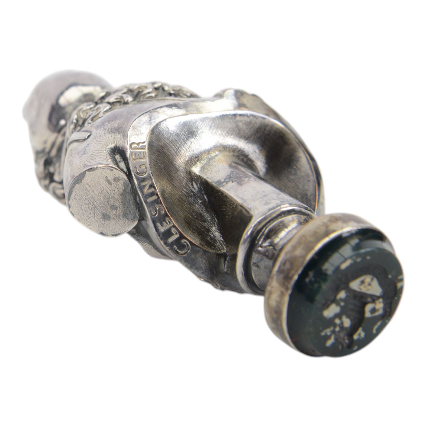 19th century French silver plated seal, modelled as a bust of Attis, Consort of Cybele after Jean Baptiste Clesinger, cast by the Marnyhac foundry, the bloodstone stamp with crest and Latin motto 'Festina Lente' (make haste slowly), H10cm, contained within original maker's fitted brown leather box with purple silk and velvet lined interior detailed 'MARNYHAC 1 RUE DE LA PAIX' 

Provenance: From the collection of Andrew Chichester Everitt.