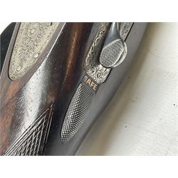 Smith Midgley Bradford 12-bore side-by-side double barrel side-lock ejector shotgun with 71cm barrels, engraved action with patented top lever, ivy leaf fences and top safety, walnut stock with chequered grip and fore-end, serial no.62409 to barrels and 1481 to action, L115cm overall SHOTGUN CERTIFICATE REQUIRED