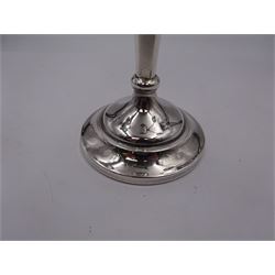 Modern silver mounted three branch candelabra, the tapering stem supporting a central candle holder and two removable curved branches with candle holders, upon spreading circular foot, hallmarked Birmingham 1968, maker's mark worn and indistinct, H25.5cm