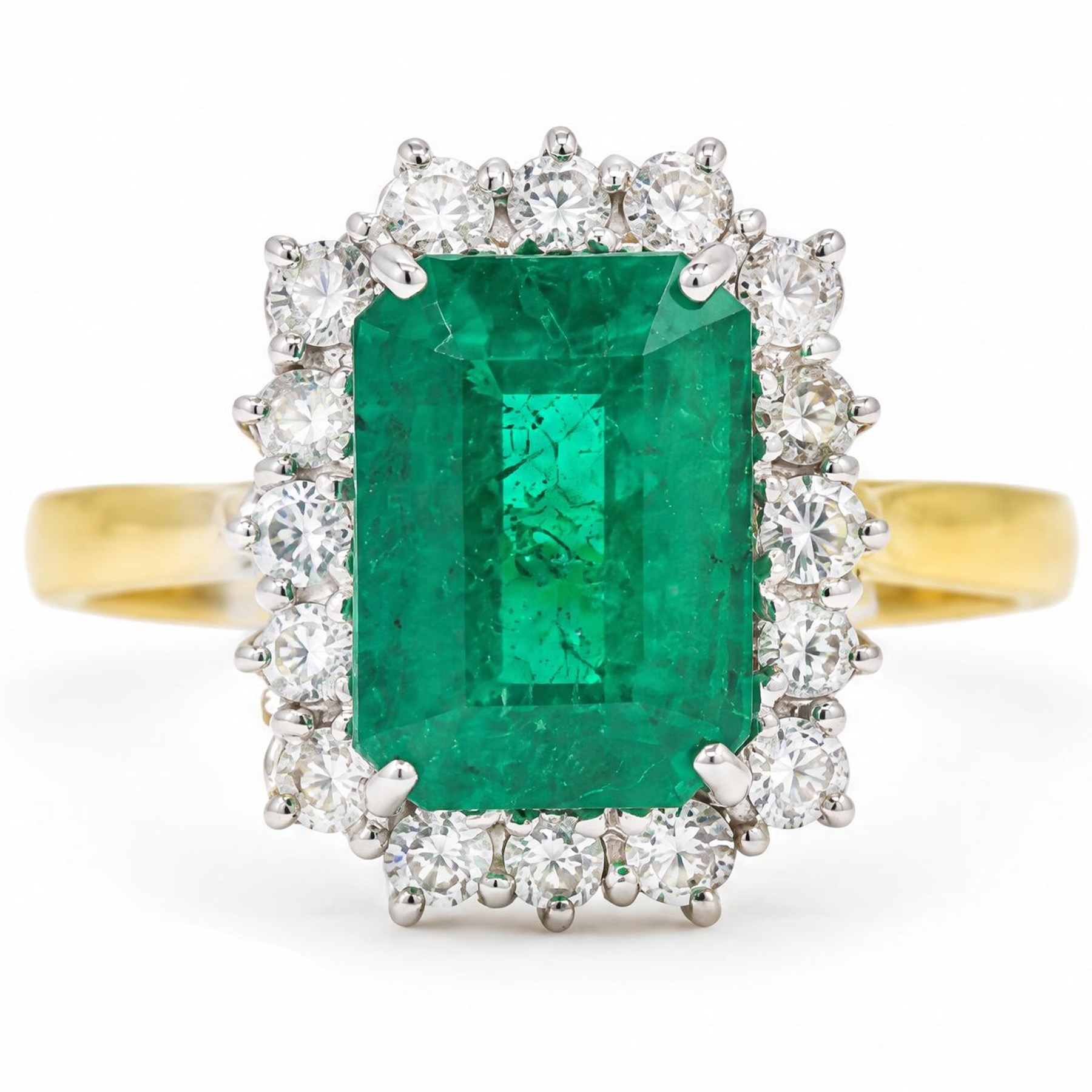 18ct gold emerald and diamond cluster ring, single octagonal cut emerald of approx 3.80 carat, surrounded by sixteen round brilliant cut diamonds, hallmarked, total diamond weight approx 0.50 carat