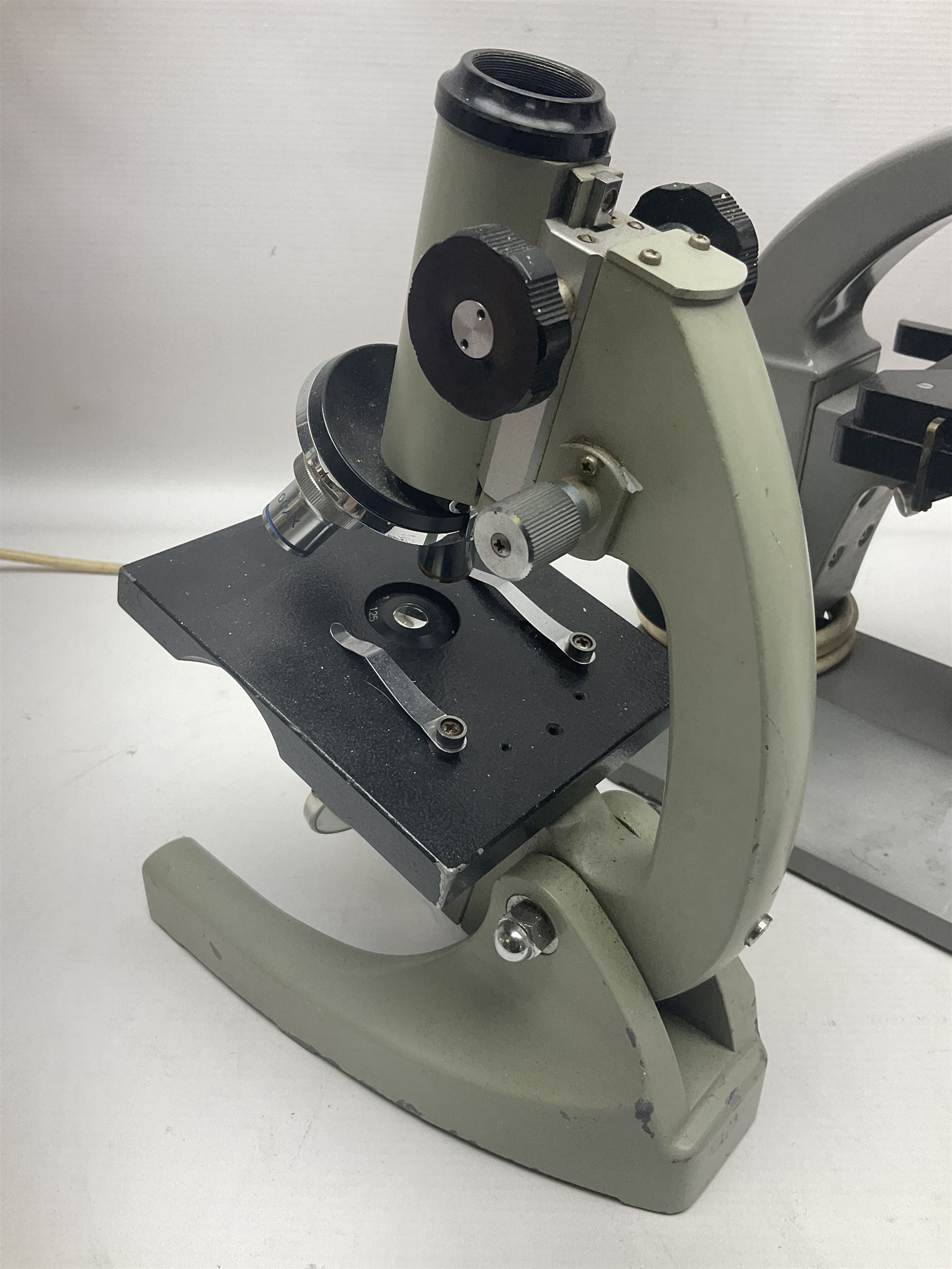 Four microscopes, comprising C Baker London Vickers, Back Diamax no 40956, Opax ABF no 232733 and one other 