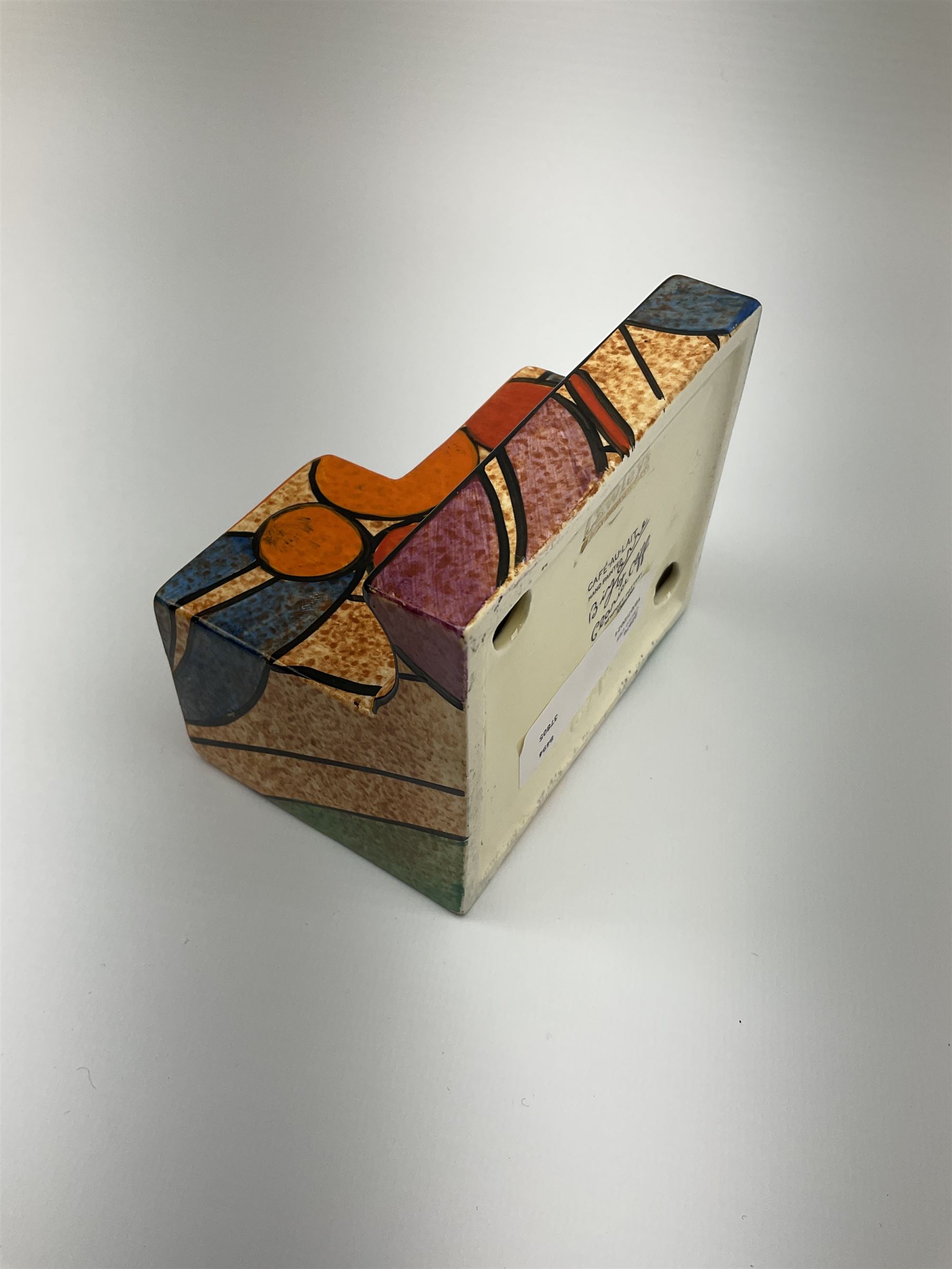 A Clarice Cliff Bizarre Cafe au lait double cube inkwell with pen tray, decorated in the Berries pattern, with printed mark to base, and shape number 462, H7cm W10cm. 