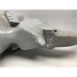 Composite figure of an elephant, painted grey, upon white base, L45cm H65cm