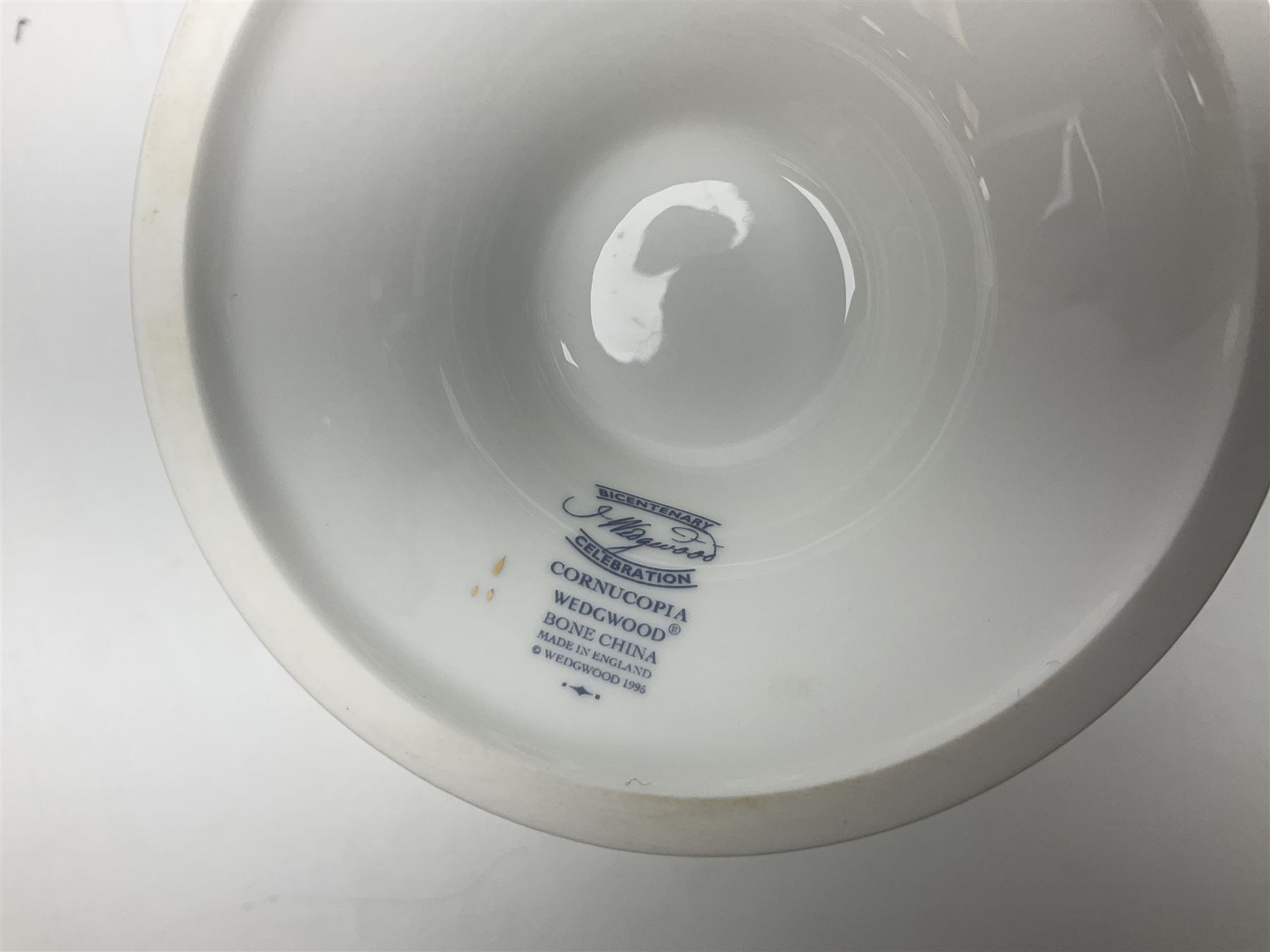 Wedgwood Cornucopia coffee service for six, comprising coffee pot, milk jug, twin handled covered sucrier, coffee cans and saucers