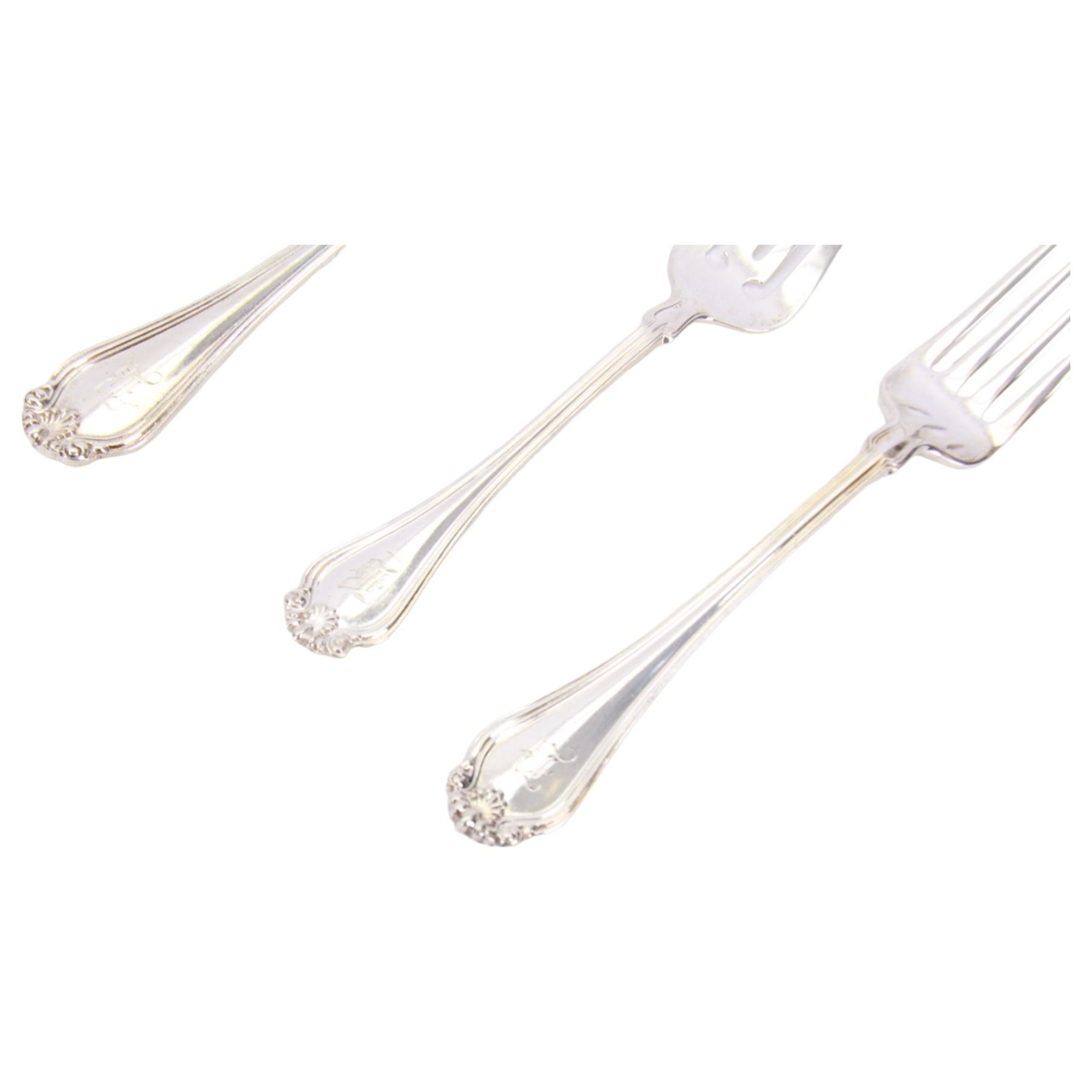 Late 19th/early 20th century American silver Shell & Thread type pattern part canteen, comprising twelve table spoons, twelve table forks, twelve dessert forks, twelve mother of pearl handled butter knives, eleven smaller mother of pearl handled butter knives, eleven teaspoons, twelve pastry forks, six parfait spoons, and large soup ladle, marked for Mermod, Jaccard & Co., St Lois, Missouri, also marked Sterling