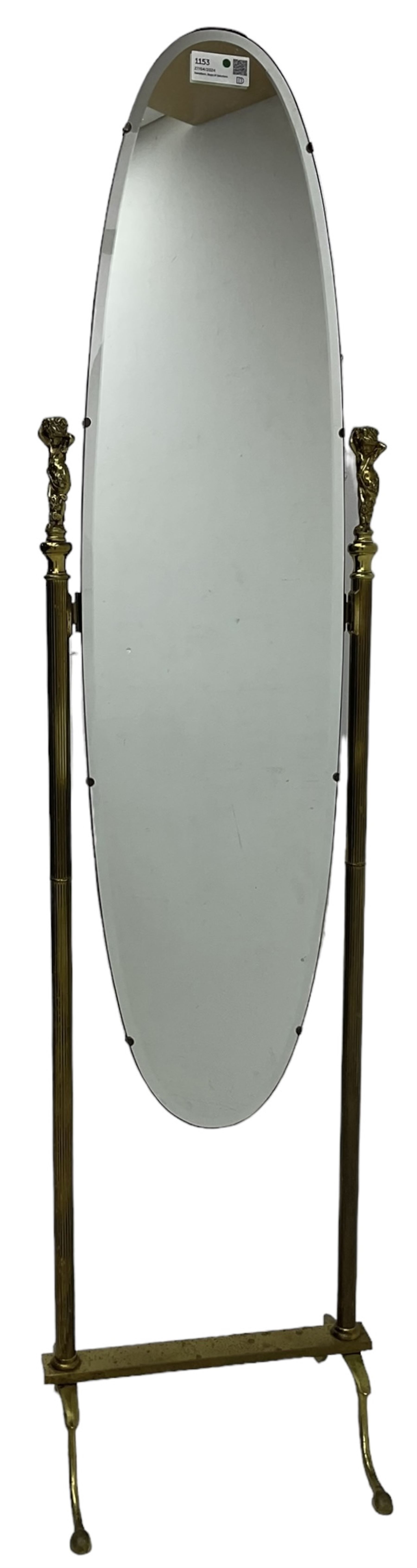Late 20th century gilt metal cheval mirror, oval bevelled mirror on reeded supports with putti finials 