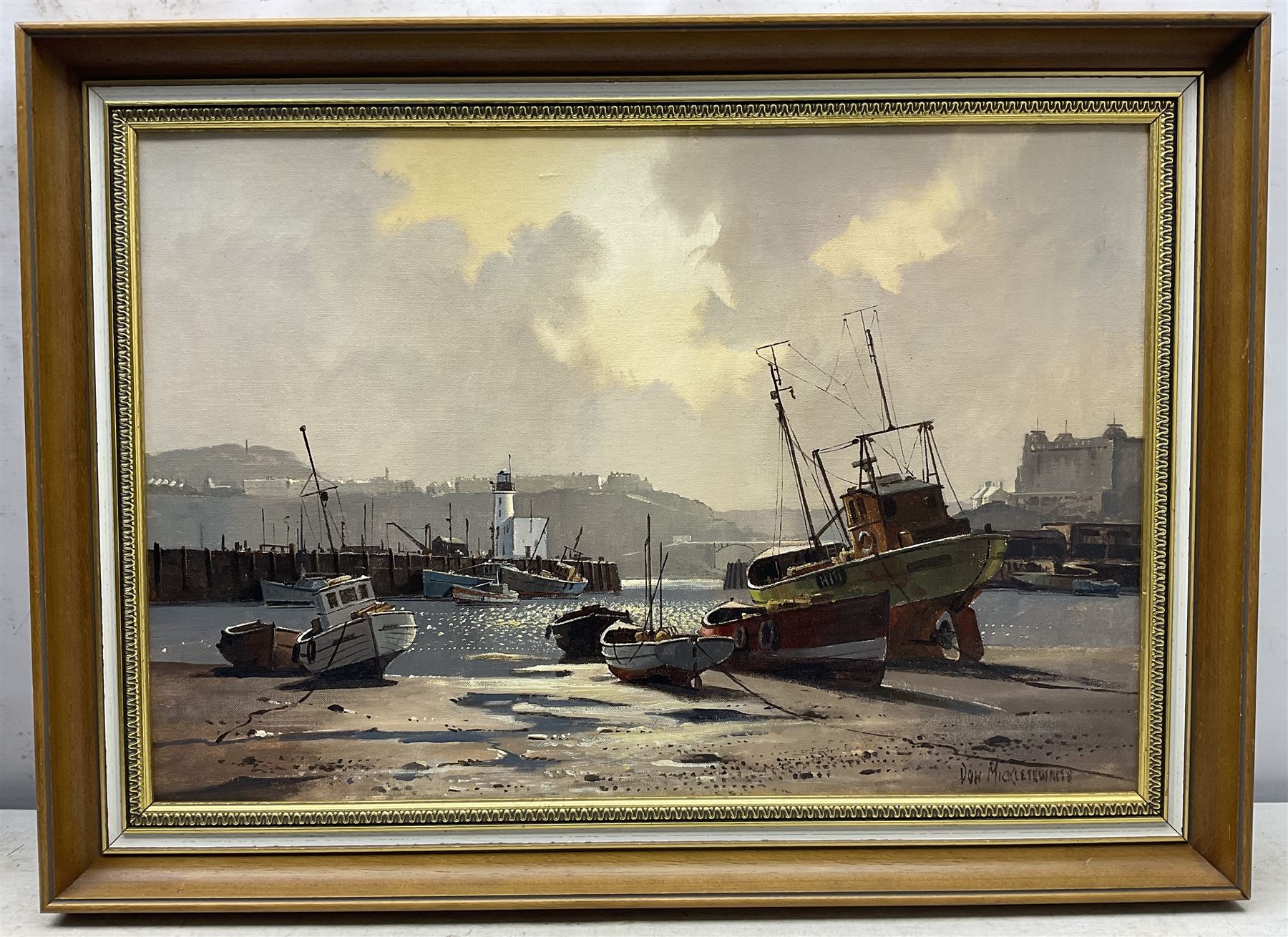 Don Micklethwaite (British 1936-): Boats at Rest in Scarborough Harbour, oil on canvas board signed 40cm x 59cm