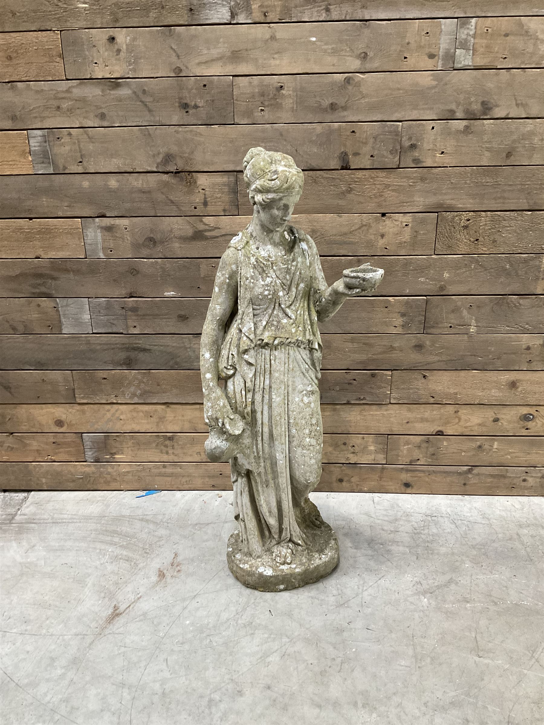 Pair of cast stone garden dogs and 2 female figures,