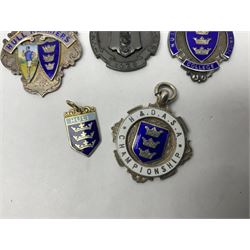 9ct gold enamel 'Hull' charm, together with eight silver fob medallions, six with enamel decoration relating to Hull and one Scarborough example, all hallmarked 