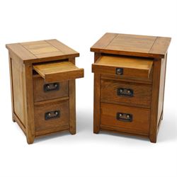 Two hardwood bedside chests,  of rectangular form, fitted with three drawers with recessed brass handles, panelled sides, and flush top, W55xD40xH68cm & W45D45xH68cm 