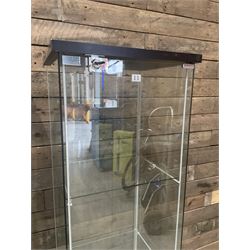 Three Ikea rosewood finish illuminated four glass shop display cabinets, with shelves and keys