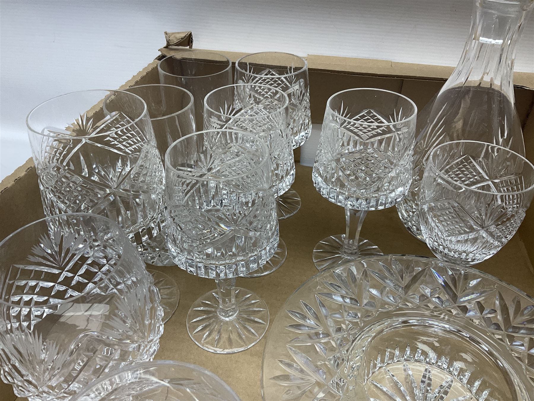 Collection of Waterford and Tyrone crystal, including wine glasses, clock, bowl, etc, together with a collection of other cut glass and crystal