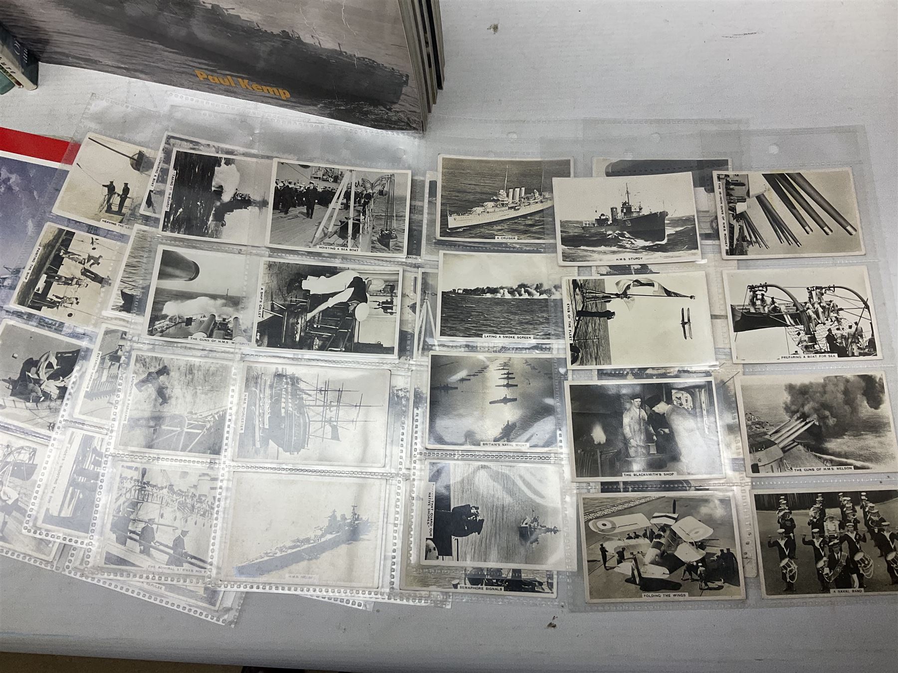 Six Atlas Editions ring binders of Warships Maxi Cards; and large quantity of booklets, cigarette cards etc of naval and shipping interest