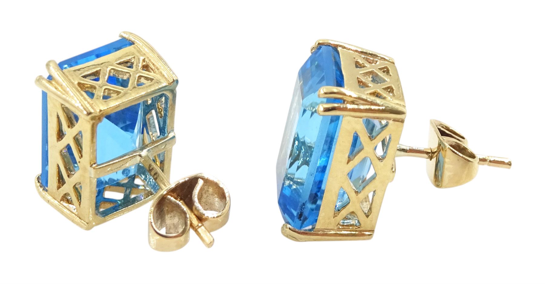 Pair of 9ct gold emerald cut blue topaz stud earrings, stamped, total topaz weight approx 16.05 carat