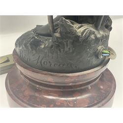 Pair of Art Nouveau style spelter figural table lamps, each mounted on rouge marble effect circular bases, with toleware flower heads and leafy decoration surrounding a female figure, H90cm
