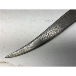 Indian Khanjar dagger with 28cm curving damascus steel blade inlaid with silver floral emblem, white metal and niello style grip in the form of a bird's head with pronounced beak and matching scabbard L44cm overall