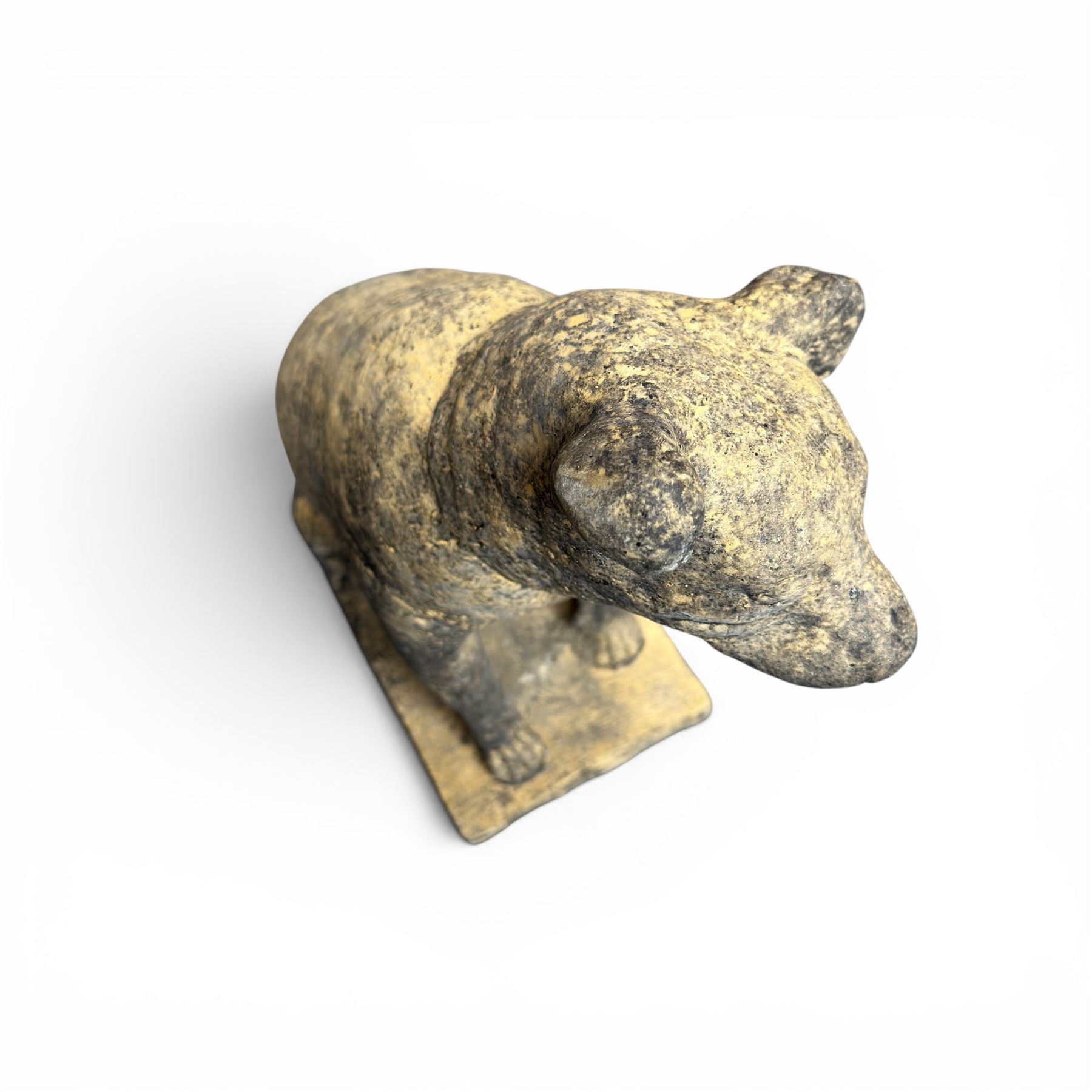 Cast stone garden statue in the form of a seated Jack Russell Terrier on a rectangular base