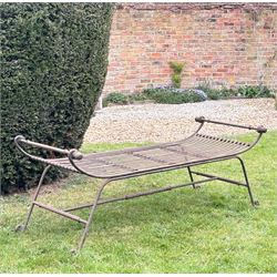 Large scrolling wrought iron garden bench in the classical style. L178cm, D70cm, H60cm. 