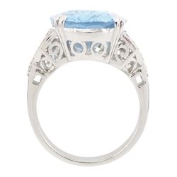 18ct white gold oval cut aquamarine ring, with milgrain set diamond, pierced design shoulders, stamp[ed 750, aquamarine approx 9.65 carat, total diamond weight approx 0.45 carat