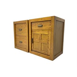 Light oak filing chest, fitted with two drawers (W61cm D51cm H77cm); and a matching oak cupboard, fitted with single drawer over panelled cupboard, enclosing sliding tray (W61cm D51cm H77cm)