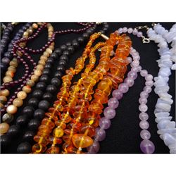 Collection of seventeen gemstone bead necklaces including coral, amber, rose quartz, goldstone and lace agate, pair of lace agate pendant earrings, chain necklace, silver hardstone heart pendant necklace and a costume necklace with matching bracelet