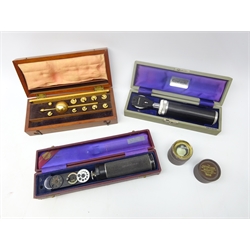  Two boxed Opthalmascopes, a Sykes Hydrometer in mahogany box and a Nauticalia Captain Cook Magnifier (4)  