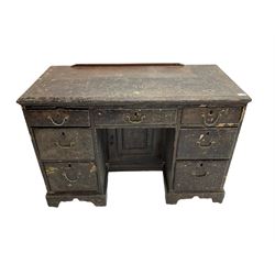 19th century scumbled pine kneehole desk, rectangular top with moulded edge, fitted with single frieze drawer flanked by six graduating drawers, on bracket feet