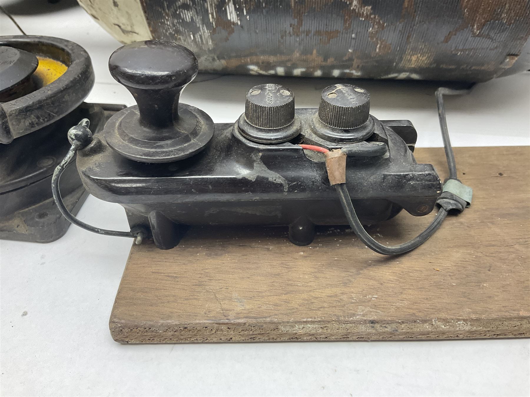 Three RAF light switches, together with military oxygen canister, batteries, gages etc  