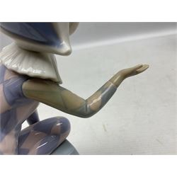 Three Lladro figures, comprising Clown with Saxophone, no 5059, Harlequin C, and Charming, with original box, largest example H27cm 