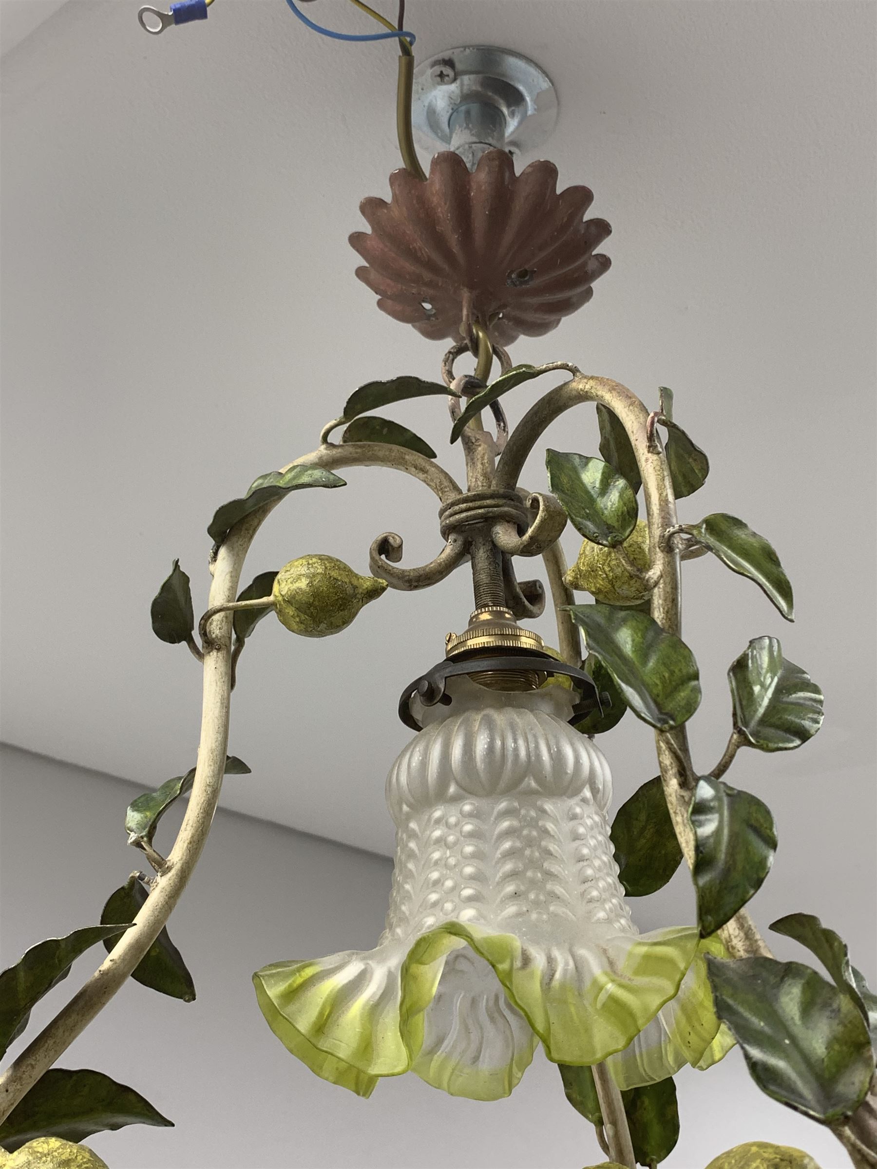 A toleware light fitting modelled with fruiting lemon vines around a frilled glass shade, approximately H48cm