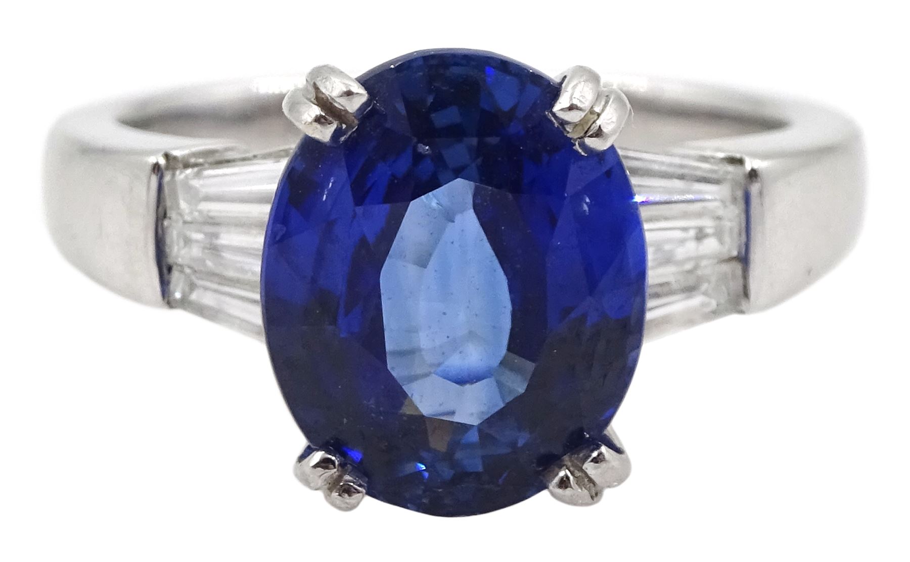 18ct white gold oval sapphire ring, with tapered baguette diamond shoulders, sapphire approx 4.15 carat