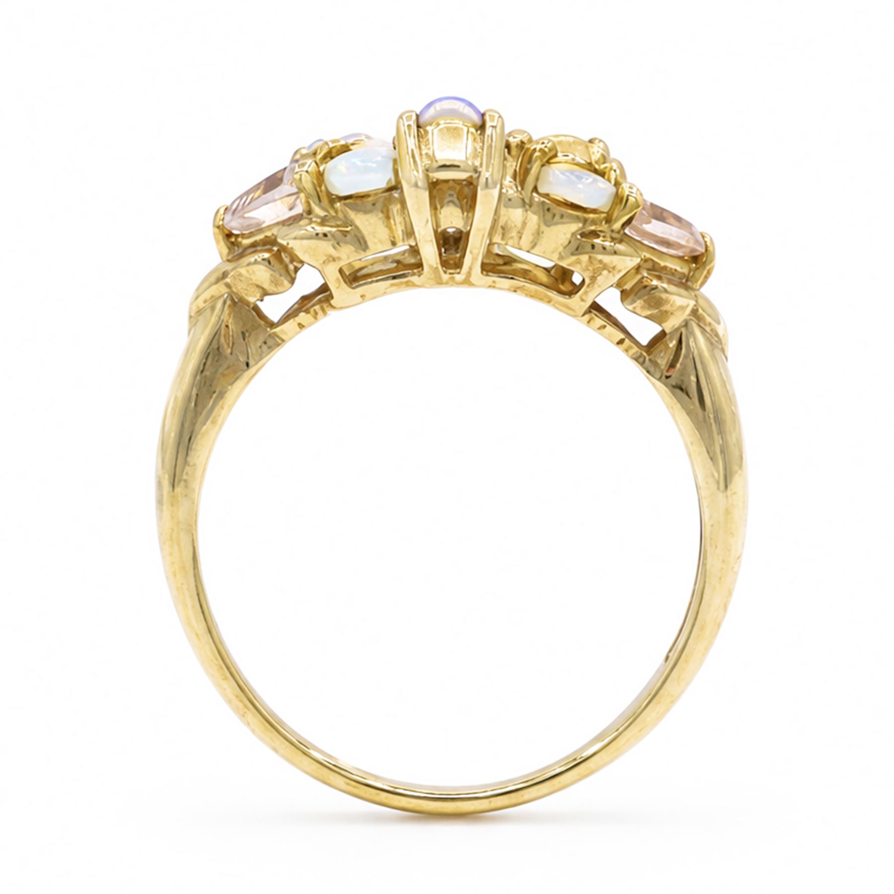 9ct gold opal, morganite and diamond cluster ring, three single cut diamond chips surrounded by six oval cut opals and two trilliant cut morganites, Birmingham 2007