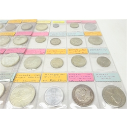  Collection of mostly silver Hungarian coinage including 1907 5 krona, 1930 5 pengo, 1939 5 pengo, 1948 20 forint, seven 50, eight 100 and nine 200 forint commemorative coins etc, housed in coin album pages  