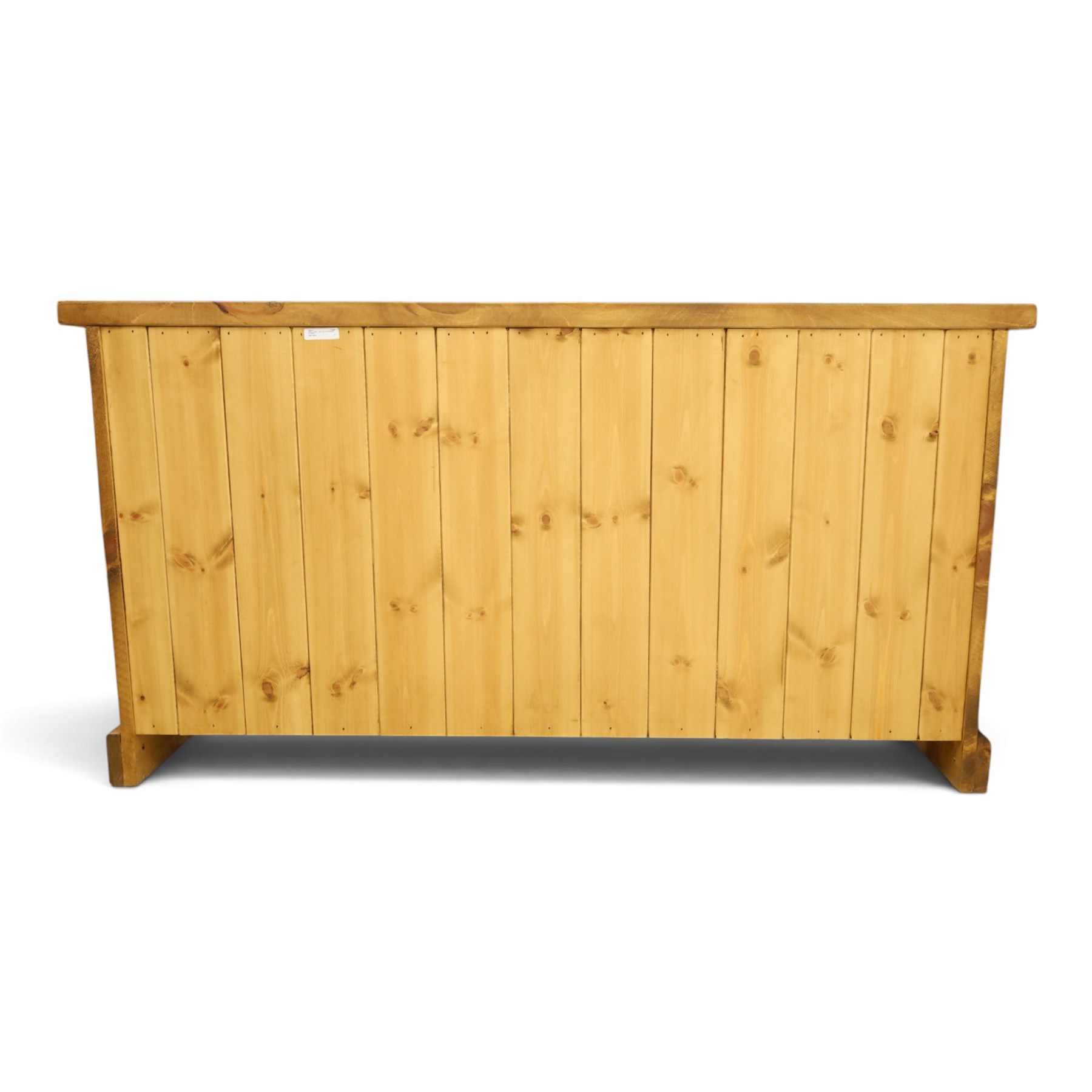 Indigo Furniture - large rustic oak chest, rectangular top fitted with six drawers with metal pull handles, on skirted base