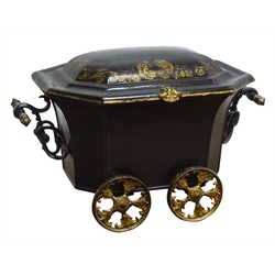  Regency Toleware coal wagon, elongated octagonal body with C scroll cast handles, stepped domed lid with chinoiserie scroll border and on four five spoked cast gilt wheels, W55cm, D37cm, H38cm, with tin liner  