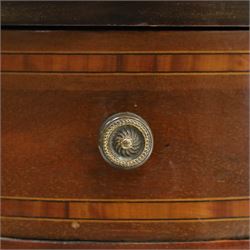 Edwardian inlaid mahogany serpentine-front side cabinet, raised back with central glazed door flanked by bow-front glass panels, the base fitted with banded and shaped frieze drawer, on square tapering supports united by concave under-tier