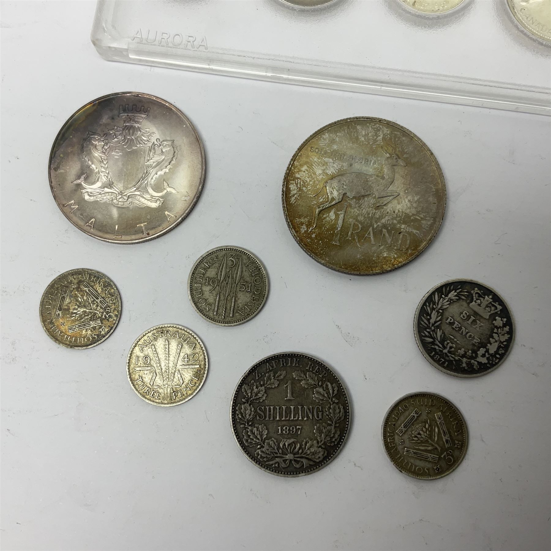 South Africa 1897 one shilling, 1967 one rand, Ireland 1928 two shillings and sixpence, Netherlands 1930 two and a half gulden, two Queen Elizabeth II Canada one dollar coins dated 1958 and 1964, 1967 six coin set in plastic holder etc