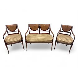 Edwardian Sheraton Revival inlaid mahogany parlour suite, comprising a two-seater settee and two matching armchairs, each with fan-shaped caned back, shaped crest rail with foliate inlay, scrolled open arms, upholstered seat with repeating geometric pattern, on turned and tapered front supports