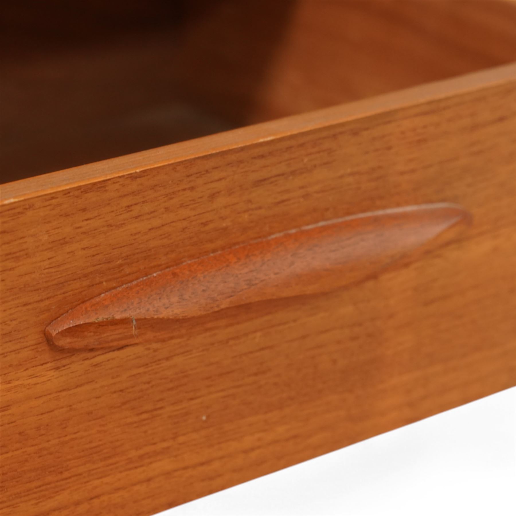 Austinsuite - mid-20th century teak dressing table or desk, fitted with seven drawers