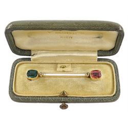 Early 20th century Austrian 14ct gold tourmaline, diamond and white enamel bar brooch, each end set with a green and pink tourmaline and a single stone diamond chip, by Ernst Paltscho (Vienna 1858-1929) hallmarked, in original fitted silk lined box 