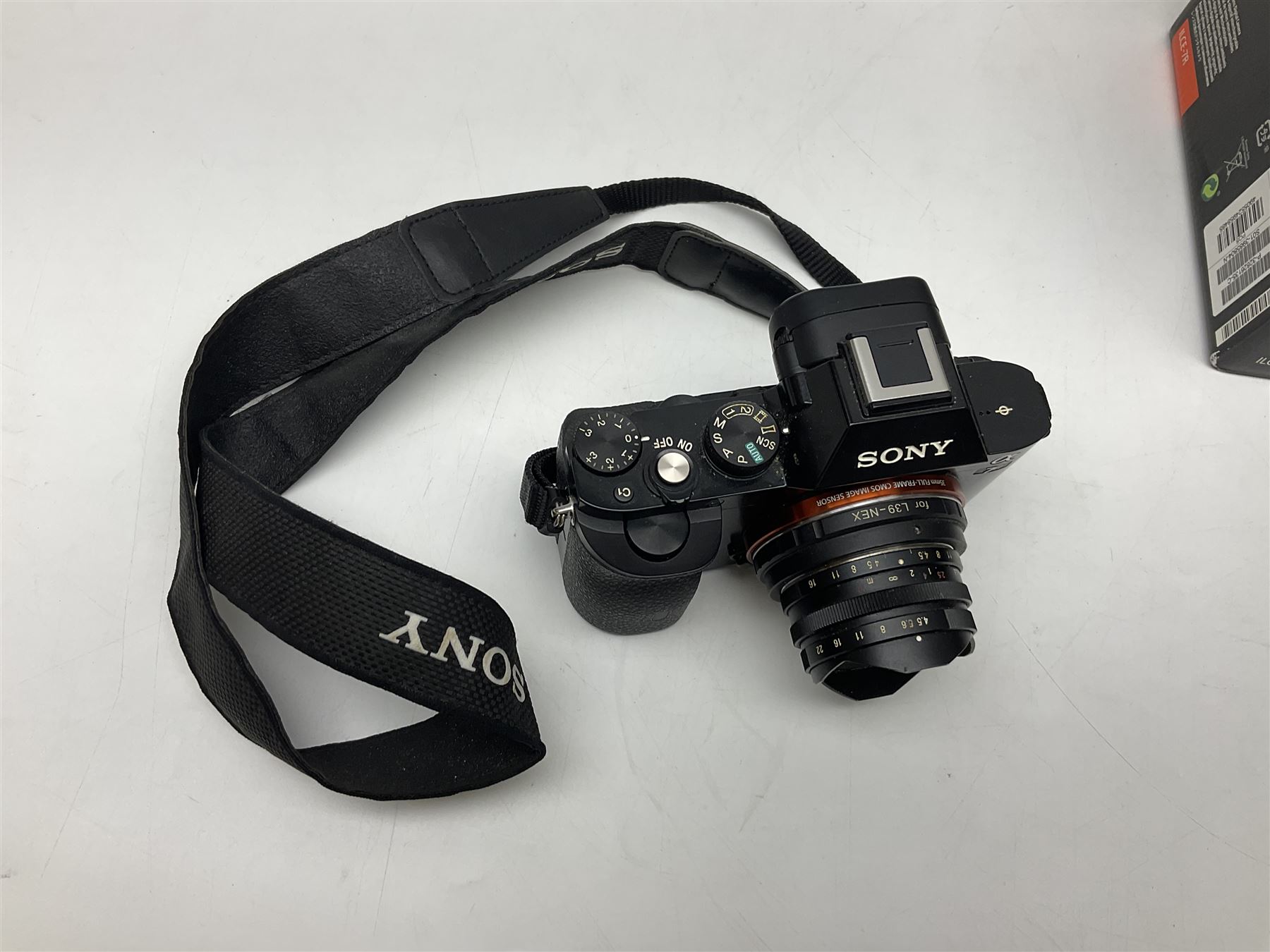 Sony Alpha 7R ILCE-7R camera body, serial no. 3985804, with 'Voigtlander Super Wide-Heliar f/4.5 15mm' lens, serial no. 9250212, camera with charger and in original box