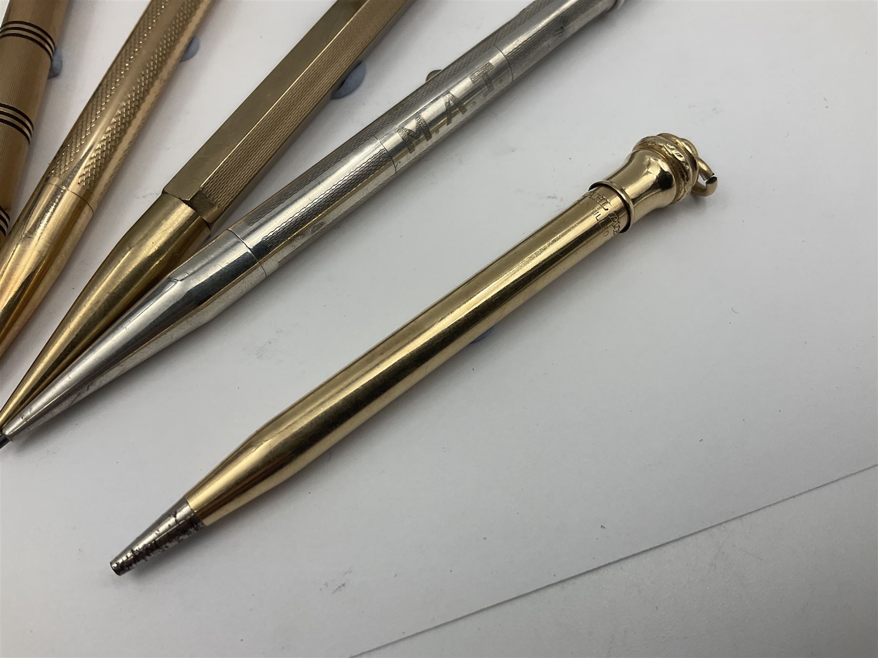 Five gold filled Wahl Eversharp propelling pencils, together with a silver propelling pencil, hallmarked London 1946, J.M.Co Johnson, Matthey & Co, and two further gold filled propelling pencils, one with box, largest L13cm (8)