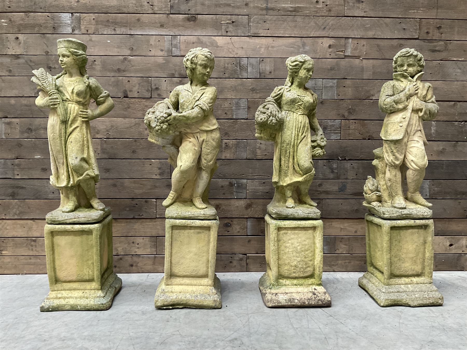 The Four Seasons - set of four cast stone garden figures on plinths