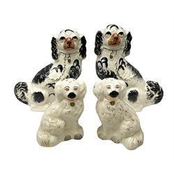 Pair of Beswick pottery chimney spaniels with painted faces and gilt collar chains, impressed factory marks and numbered 1378-5, together with another similar example