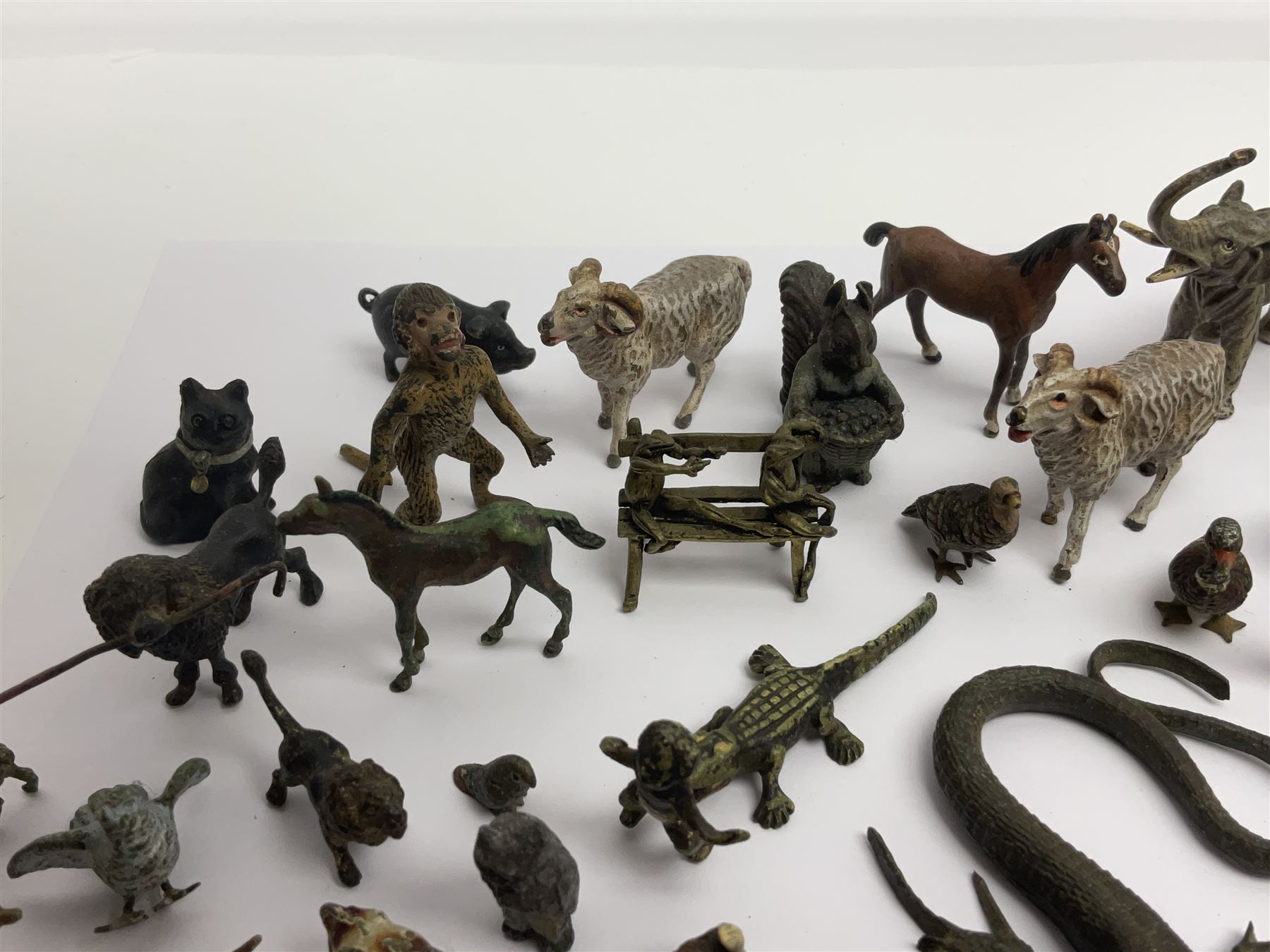 Collection of miniature cold painted bronze and similar animals, to include birds, sheep, horses etc 