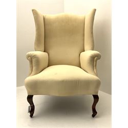 Early 20th century beech framed wingback armchair, on cabriole front supports