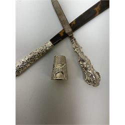 Silver thimble embossed with the figure of a dog and stamped 925, silver handled nail file, hallmarked Birmingham 1904, and silver handled letter opener, hallmarked London 1905, together with a quantity of silver plate, to include a caddy of canted form, shaped box with hinged cover, photograph frame, two entrée dishes, pierced bowl, small group of flatware, etc. 