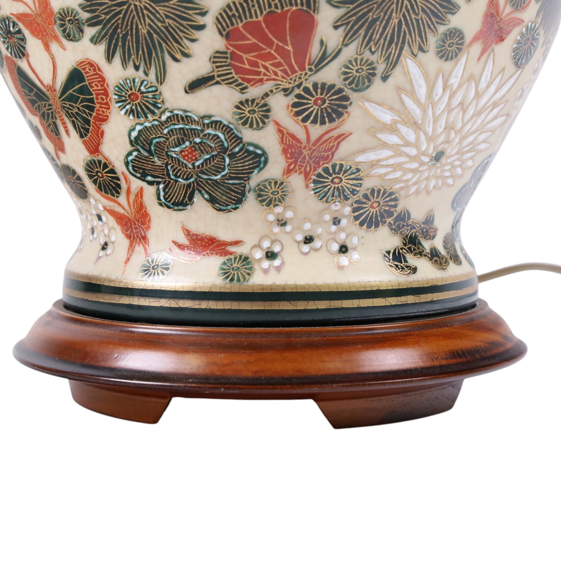 Japanese ceramics table lamp, decorated with flowers and butterflies upon a circular wooden base, H52cm