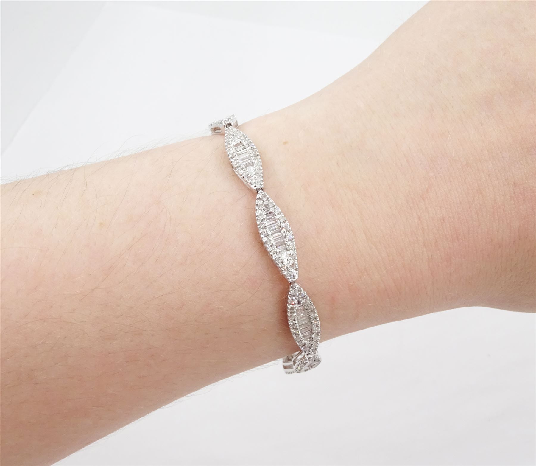 18ct white gold round brilliant cut and baguette cut diamond, marquise shaped link bracelet, hallmarked, total diamond weight approx 3.00 carat